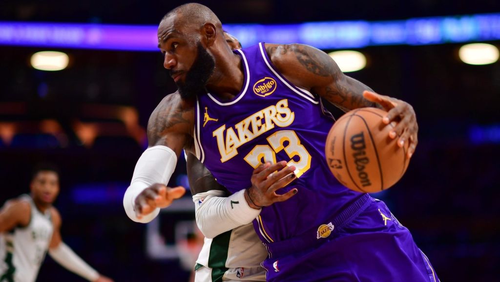 Jan 9, 2026; Los Angeles, California, USA; Los Angeles Lakers forward LeBron James (23) moves the ball against Milwaukee Bucks guard Kevin Porter Jr. (7) during the second half at Crypto.com Arena.