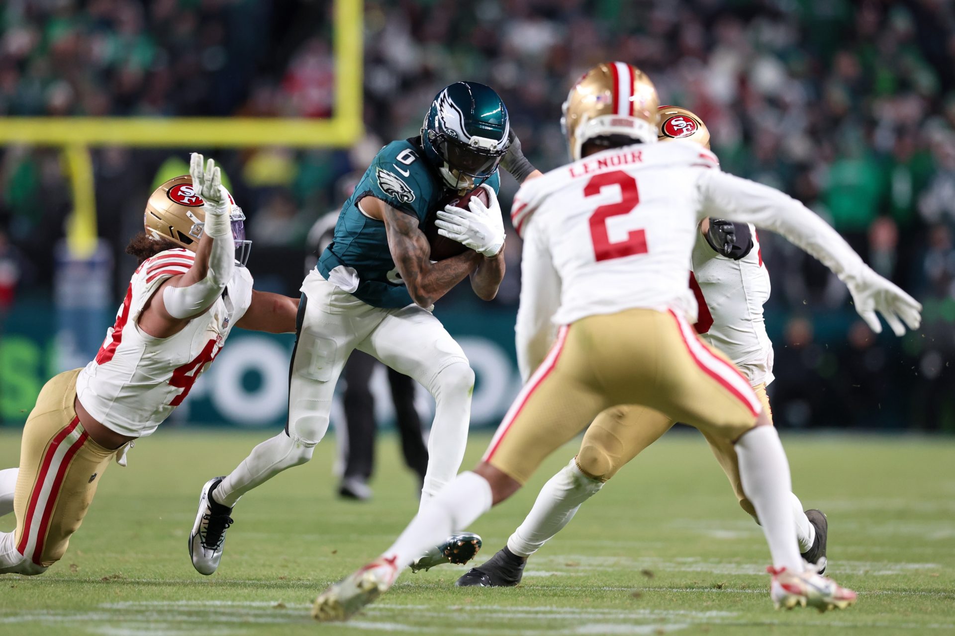 Jan 11, 2026; Philadelphia, PA, USA; Philadelphia Eagles wide receiver DeVonta Smith (6) carries the ball after a reception against the San Francisco 49ers during the fourth quarter in an NFC Wild Card Round game at Lincoln Financial Field.