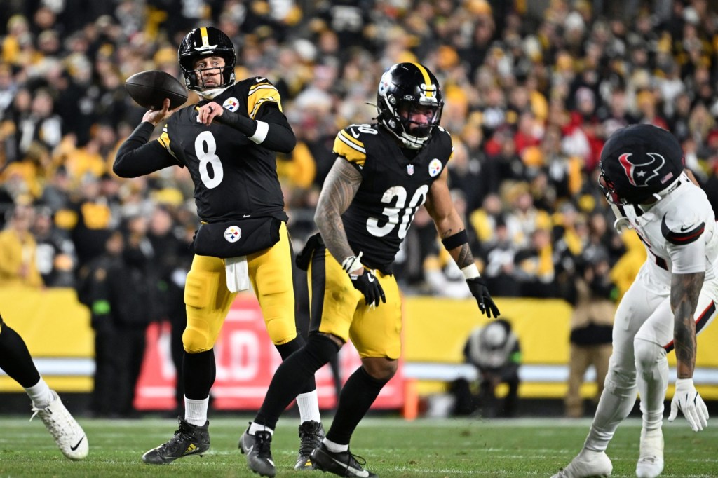Jan 12, 2026; Pittsburgh, PA, USA; Pittsburgh Steelers quarterback Aaron Rodgers (8) throws during the first half of an AFC Wild Card Round game against the Houston Texans at Acrisure Stadium.