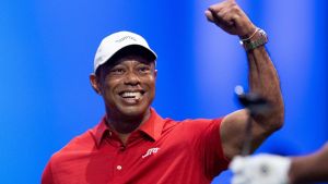 Tiger Woods of Jupiter Links cheers on a teammate during a TGL match against New York Golf Club at SoFi Center on January 13, 2026, in Palm Beach Gardens, Florida.