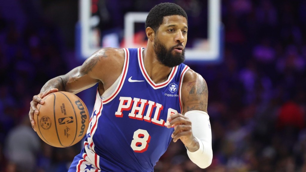 Jan 14, 2026; Philadelphia, Pennsylvania, USA; Philadelphia 76ers forward Paul George (8) drives against the Cleveland Cavaliers during the second quarter at Xfinity Mobile Arena.