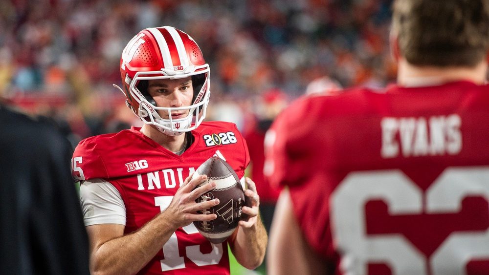 Indiana's Fernando Mendoza (15) gets loose before the College Football Playoff National Championship college football game at Hard Rock Stadium in Miami Gardens on Monday, Jan. 19, 2026.