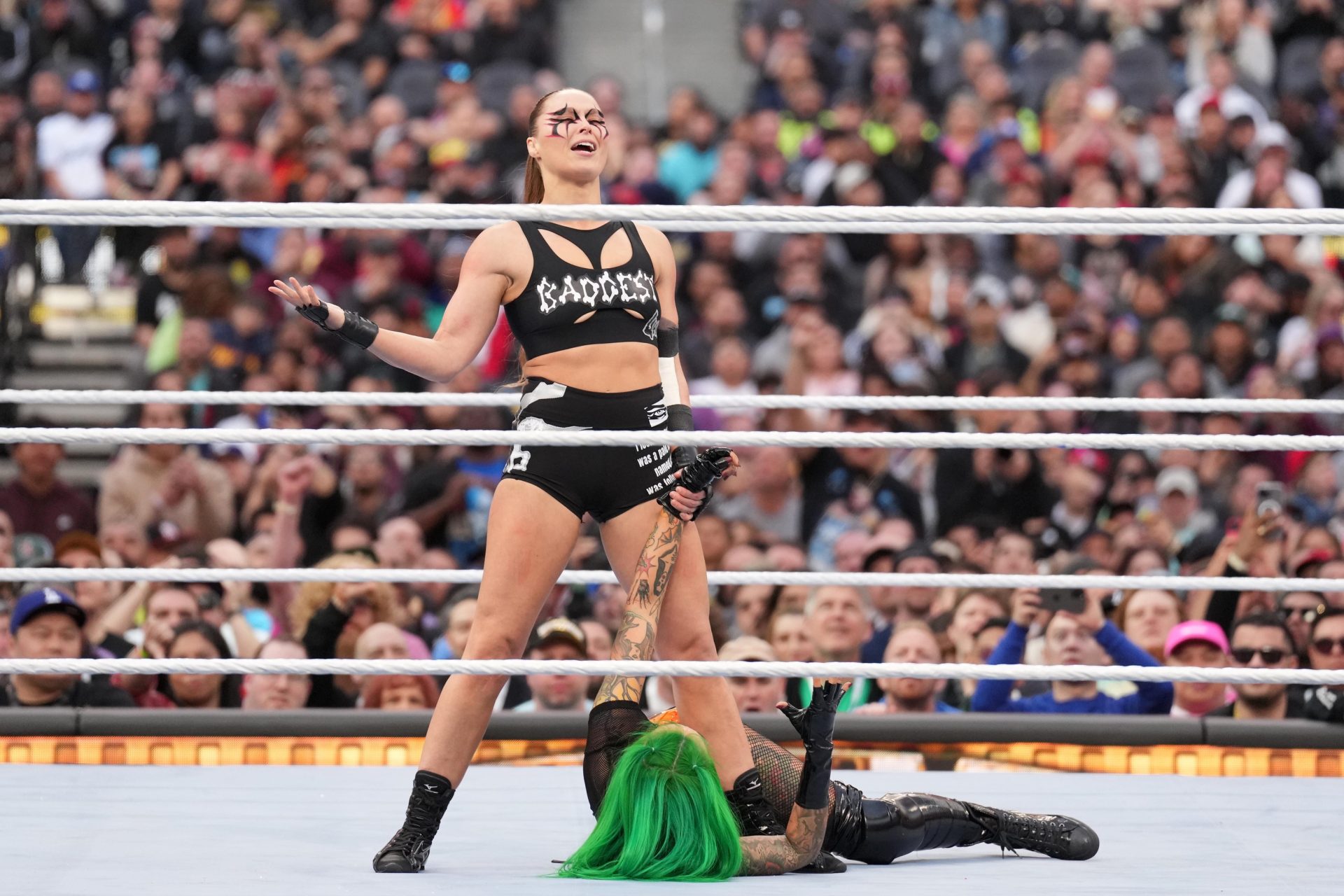 Apr 2, 2023; Inglewood, CA, USA; Ronda Rousey (black attire) and Shotzi (green hair) during Wrestlemania Night 2 at SoFi Stadium.