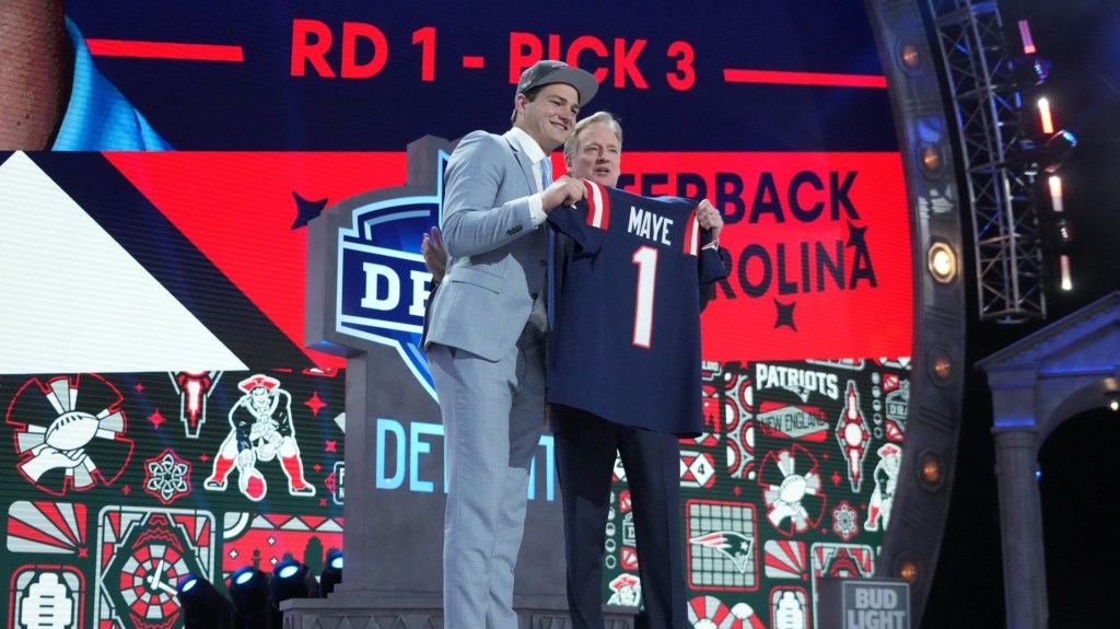 Apr 25, 2024; Detroit, MI, USA; North Carolina Tar Heels quarterback Drake Maye poses with NFL commissioner Roger Goodell after being selected by the New England Patriots as the No. 3 pick in the first round of the 2024 NFL Draft at Campus Martius Park and Hart Plaza.
