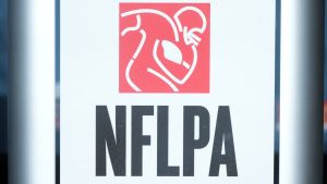 Feb 5, 2025; New Orleans, LA, USA; The NFLPA logo at press conference at the Super Bowl LIX media center at the Ernest N. Morial Convention Center. Mandatory Credit: Kirby Lee-Imagn Images
