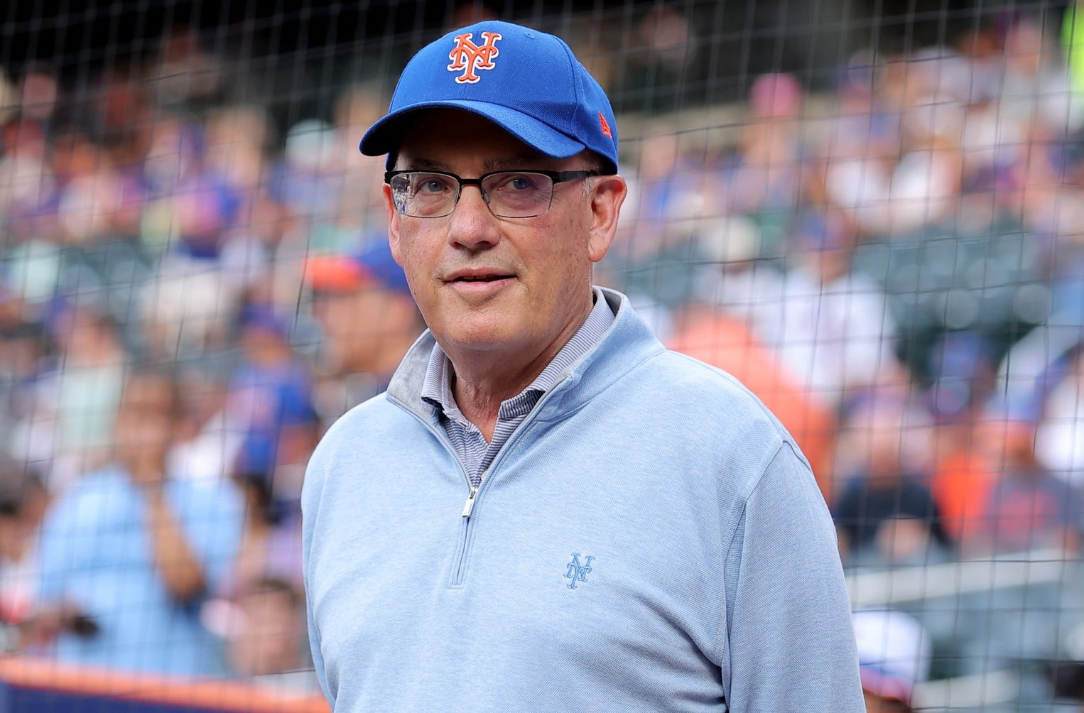 Aug 14, 2025; New York City, New York, USA; New York Mets owner Steve Cohen stands on the field before a ceremony to honor first baseman Pete Alonso (not pictured) for breaking the Mets all time home run record before a game against the Atlanta Braves at Citi Field.