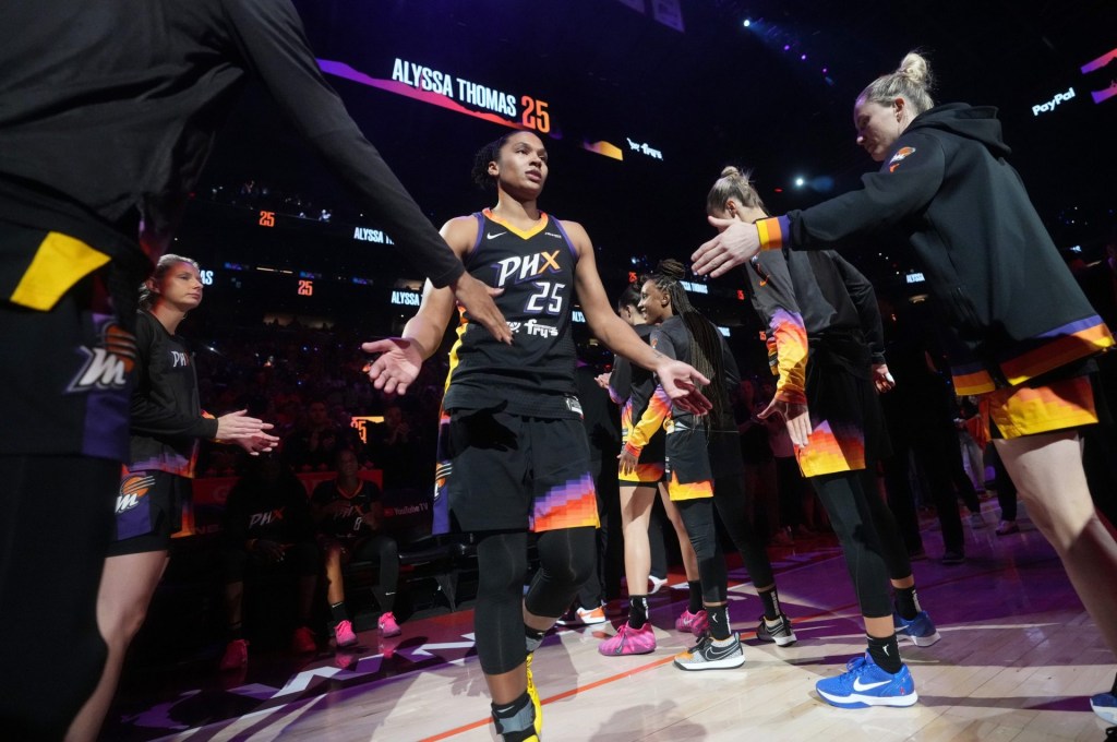 Phoenix Mercury forward Alyssa Thomas (25) is introduced before the WNBA Finals Game 3 against Las Vegas Aces at Mortgage Matchup Center in Phoenix on Oct. 8, 2025.