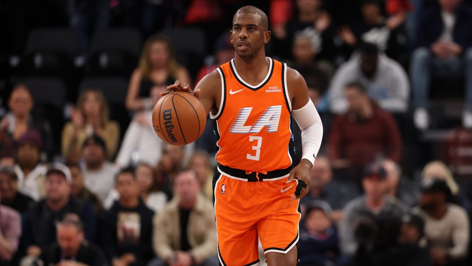 Nov 29, 2025; Inglewood, California, USA; Los Angeles Clippers guard Chris Paul (3) brings the ball up court during the first quarter against the Dallas Mavericks at Intuit Dome.