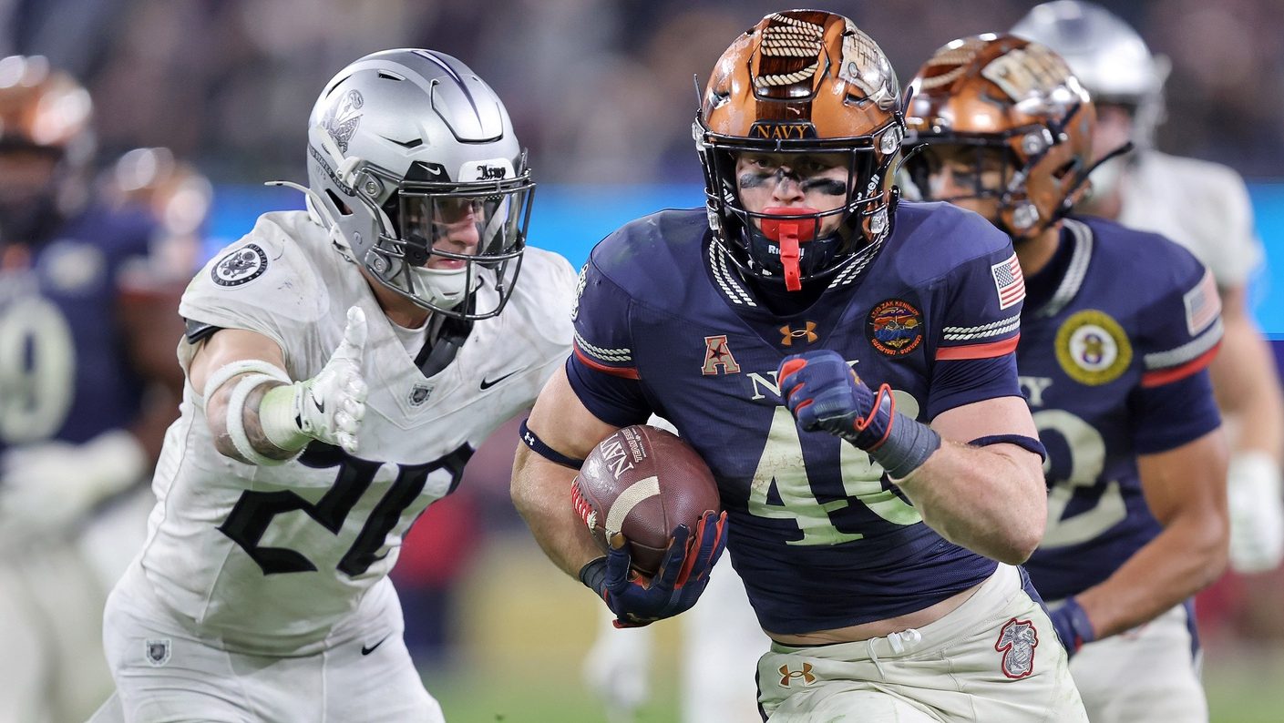 Dec 13, 2025; Baltimore, Maryland, USA; Navy Midshipmen slotback Justin Brown (46) runs the ball against the Army Black Knights during the second half of the 126th Army-Navy game at M&T Bank Stadium. Mandatory Credit: Danny Wild-Imagn Images