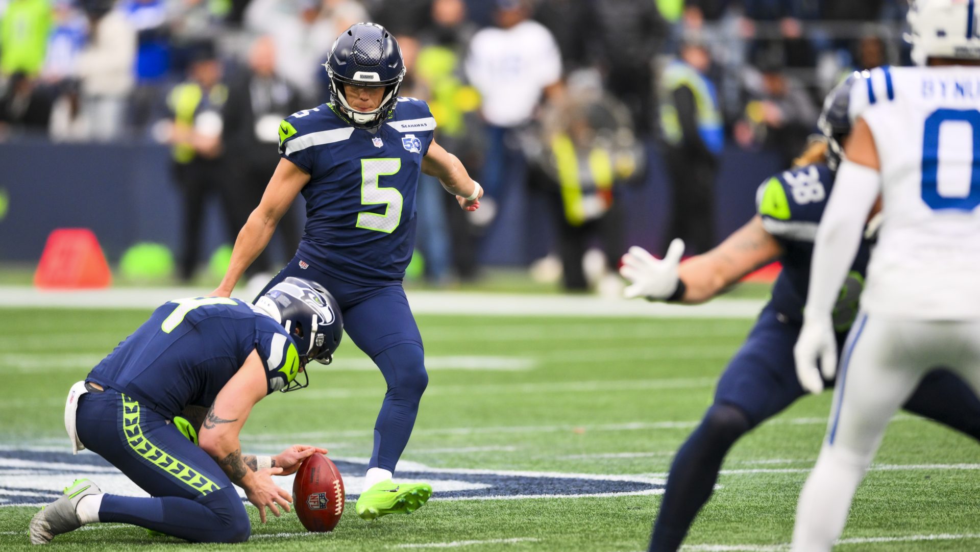 Dec 14, 2025; Seattle, Washington, USA; Seattle Seahawks place kicker Jason Myers (5) kicks a field goal against the Indianapolis Colts during the second quarter at Lumen Field.