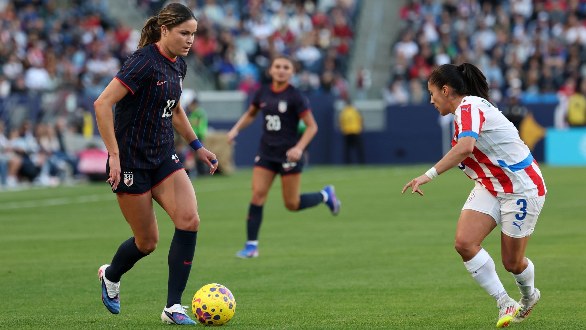 Jan 24, 2026; Carson, California, USA; United States forward Emma Sears (19) dribbles the ball against Paraguay defender Daysy Bareiro (3) during the second half at Dignity Health Sports Park.