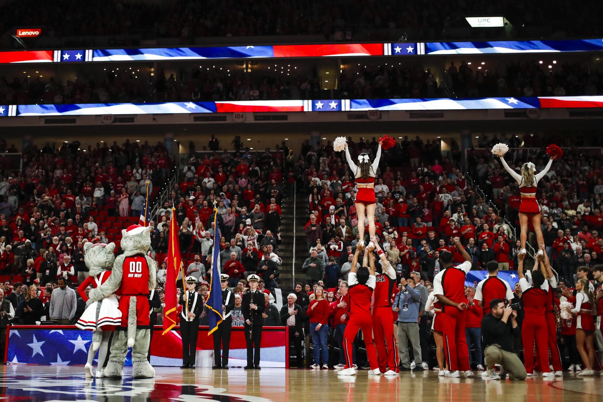 Feb 7, 2026; Raleigh, North Carolina, USA; NC State Wolfpack JROTC does the National Anthem before dribbles the first half of the game against the Virginia Tech Hokies at Lenovo Center.