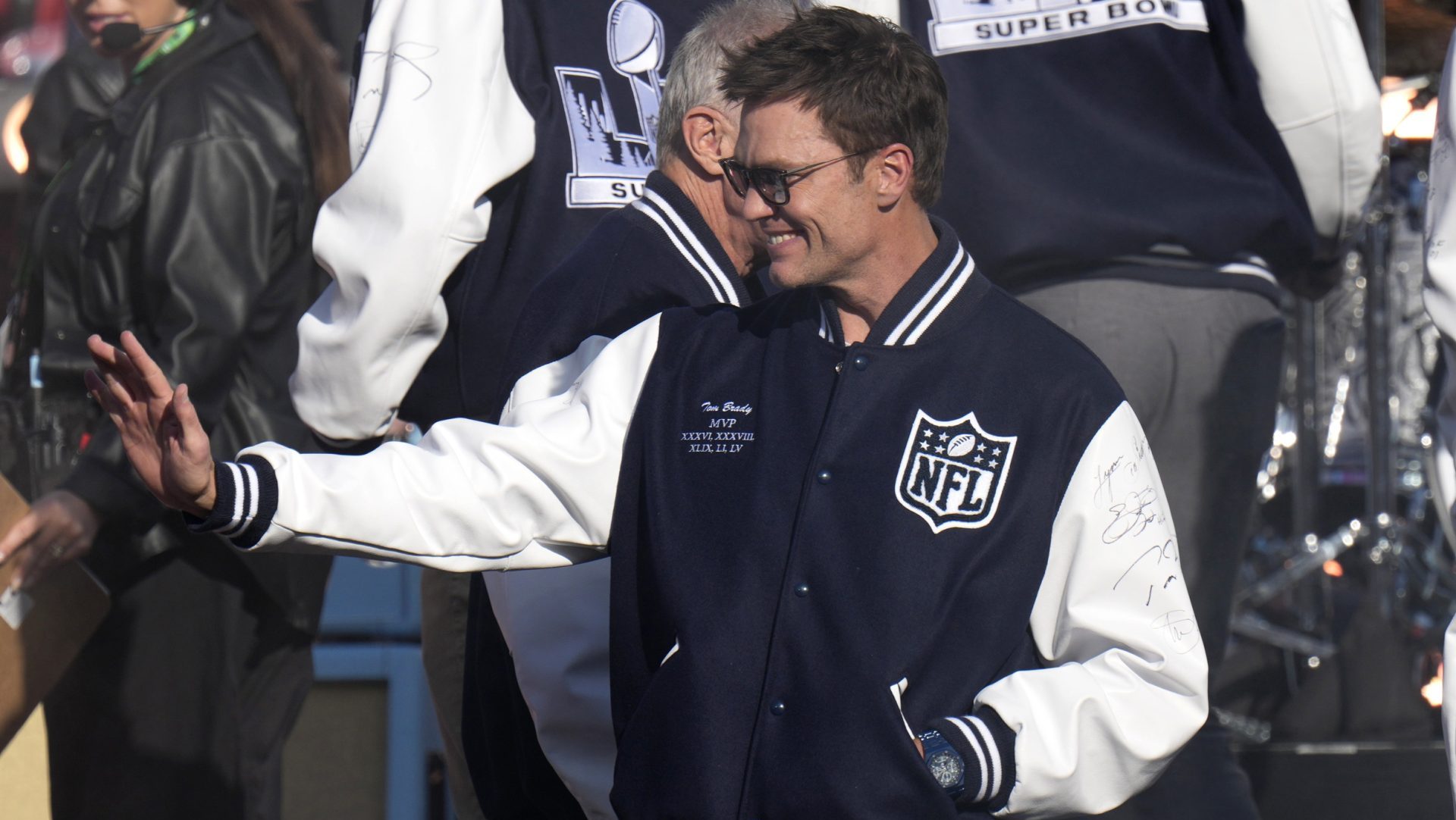 Feb 8, 2026; Santa Clara, CA, USA; Tom Brady waves before Super Bowl LX between the Seattle Seahawks and the New England Patriots at Levi's Stadium.