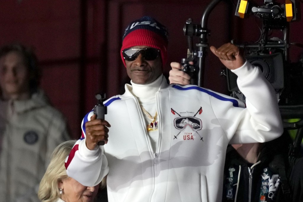 Feb 17, 2026; Milan, Italy; Snoop Dogg looks on in the womens figure skating short program during the Milano Cortina 2026 Olympic Winter Games at Milano Ice Skating Arena.