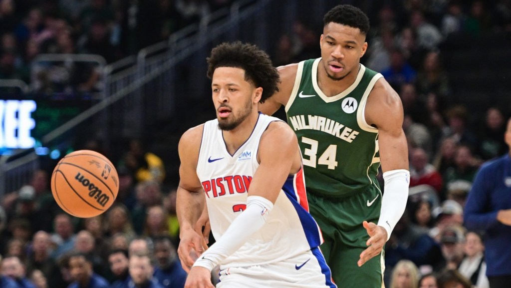 Dec 16, 2023; Milwaukee, Wisconsin, USA; Detroit Pistons guard Cade Cunningham (2) is guarded by Milwaukee Bucks forward Giannis Antetokounmpo (34) in the first quarter at Fiserv Forum. Mandatory Credit: Benny Sieu-USA TODAY Sports