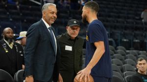 Feb 23, 2024; San Francisco, California, USA; Charlotte Hornets color commentator Dell Curry (left) talks with Golden State Warriors guard Stephen Curry (right) before the game at Chase Center. Mandatory Credit: Darren Yamashita-USA TODAY Sports