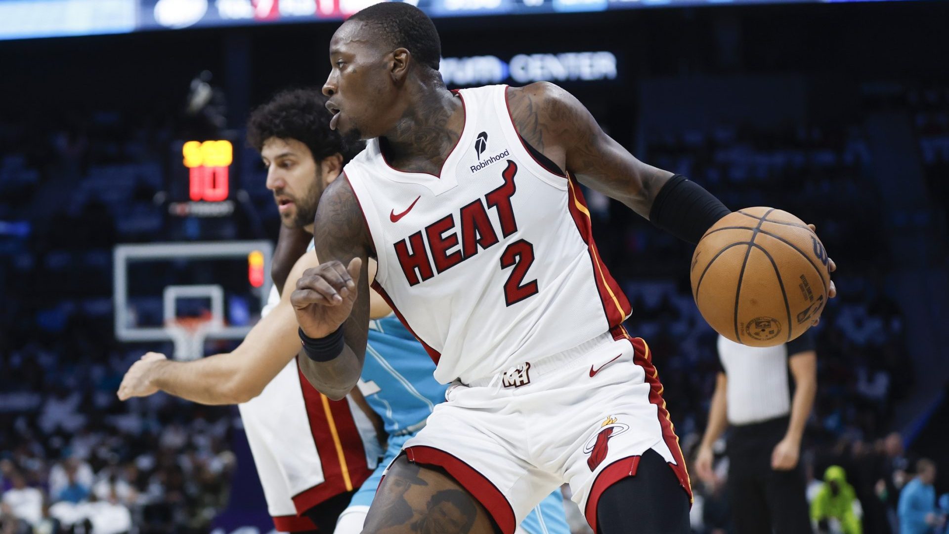 Oct 26, 2024; Charlotte, North Carolina, USA; Miami Heat guard Terry Rozier (2) drives the baseline against the Charlotte Hornets during the first quarter at Spectrum Center. Mandatory Credit: Nell Redmond-Imagn Images
