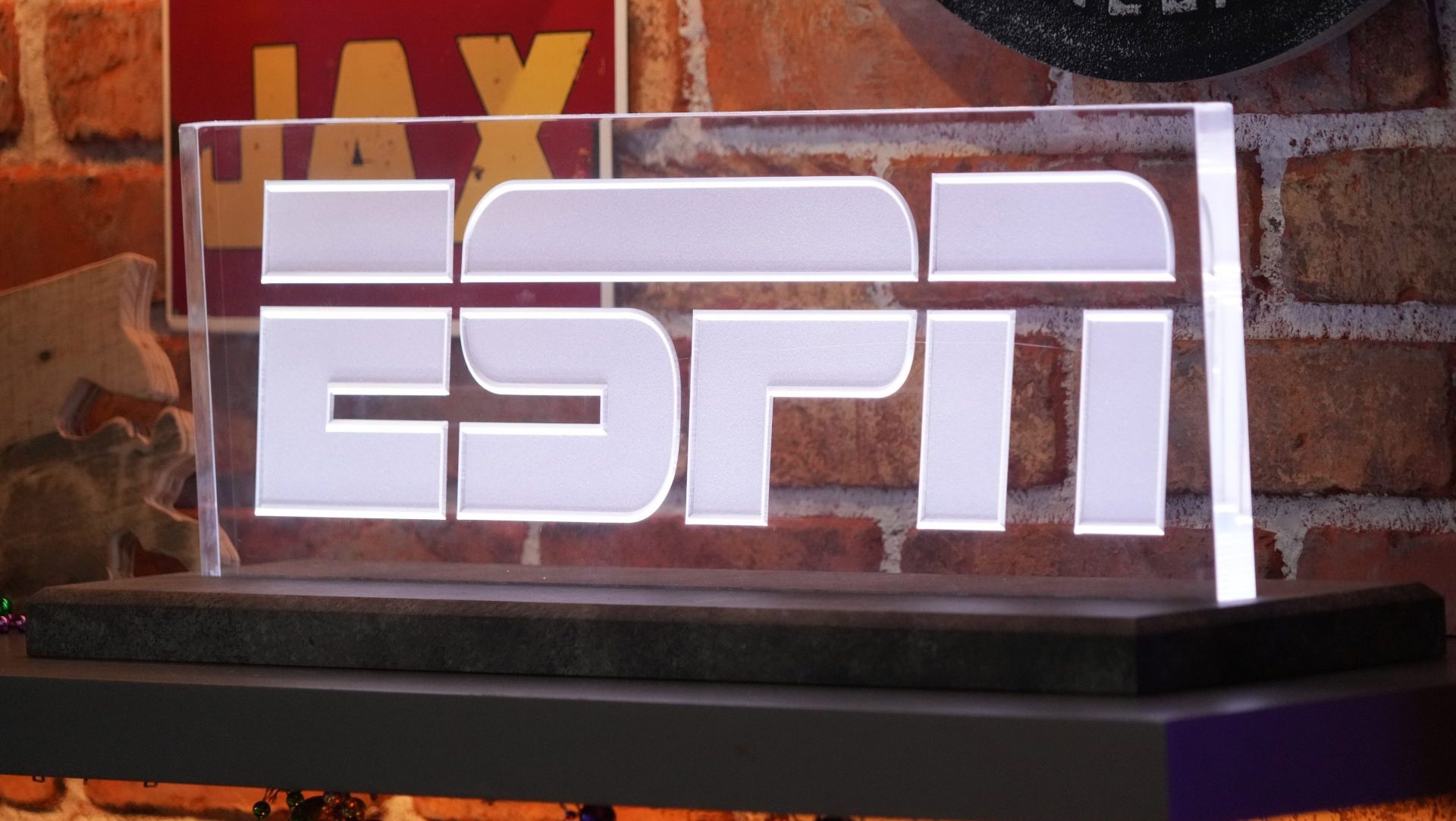 Feb 5, 2025; New Orleans, LA, USA; The ESPN logo at the Super Bowl LIX media center at the Ernest N. Morial Convention Center. Mandatory Credit: Kirby Lee-Imagn Images