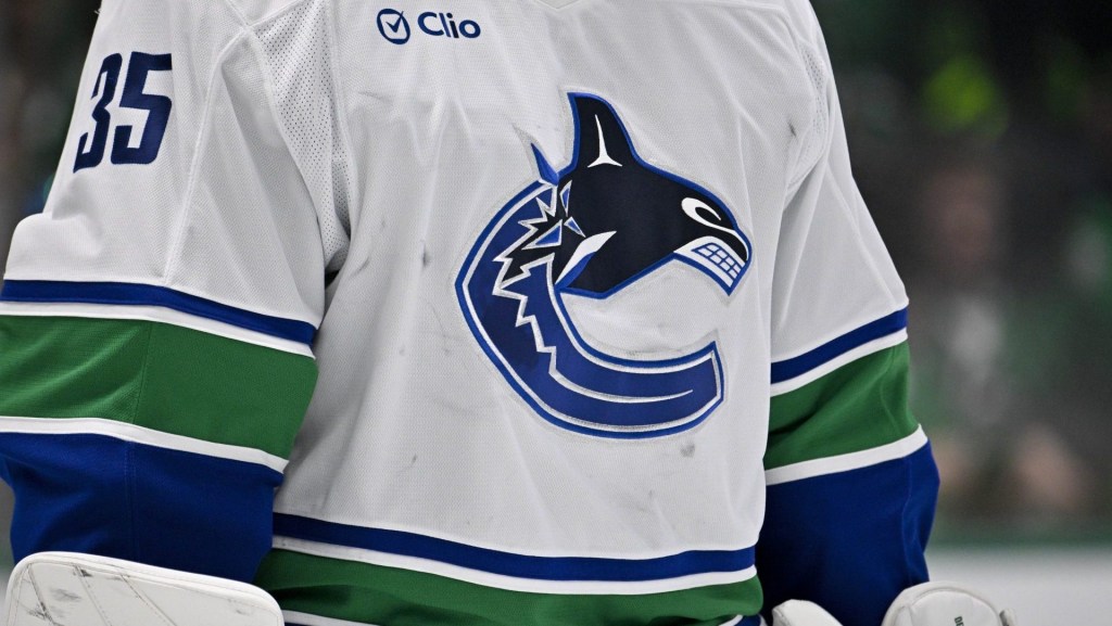 Jan 31, 2025; Dallas, Texas, USA; A view of the team logo on the jersey of Vancouver Canucks goaltender Thatcher Demko (35) during the game between the Dallas Stars and the Vancouver Canucks at the American Airlines Center. Mandatory Credit: Jerome Miron-Imagn Images