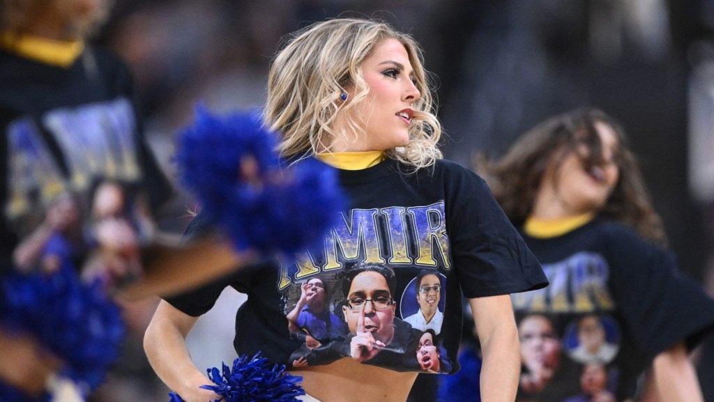 Mar 22, 2025; Providence, RI, USA; McNeese State Cowboys cheerleaders wear shirts for McNeese State Cowboys manager Amir Khan (not pictured) during the first half of a second round men’s NCAA Tournament game against the Purdue Boilermakers at Amica Mutual Pavilion.