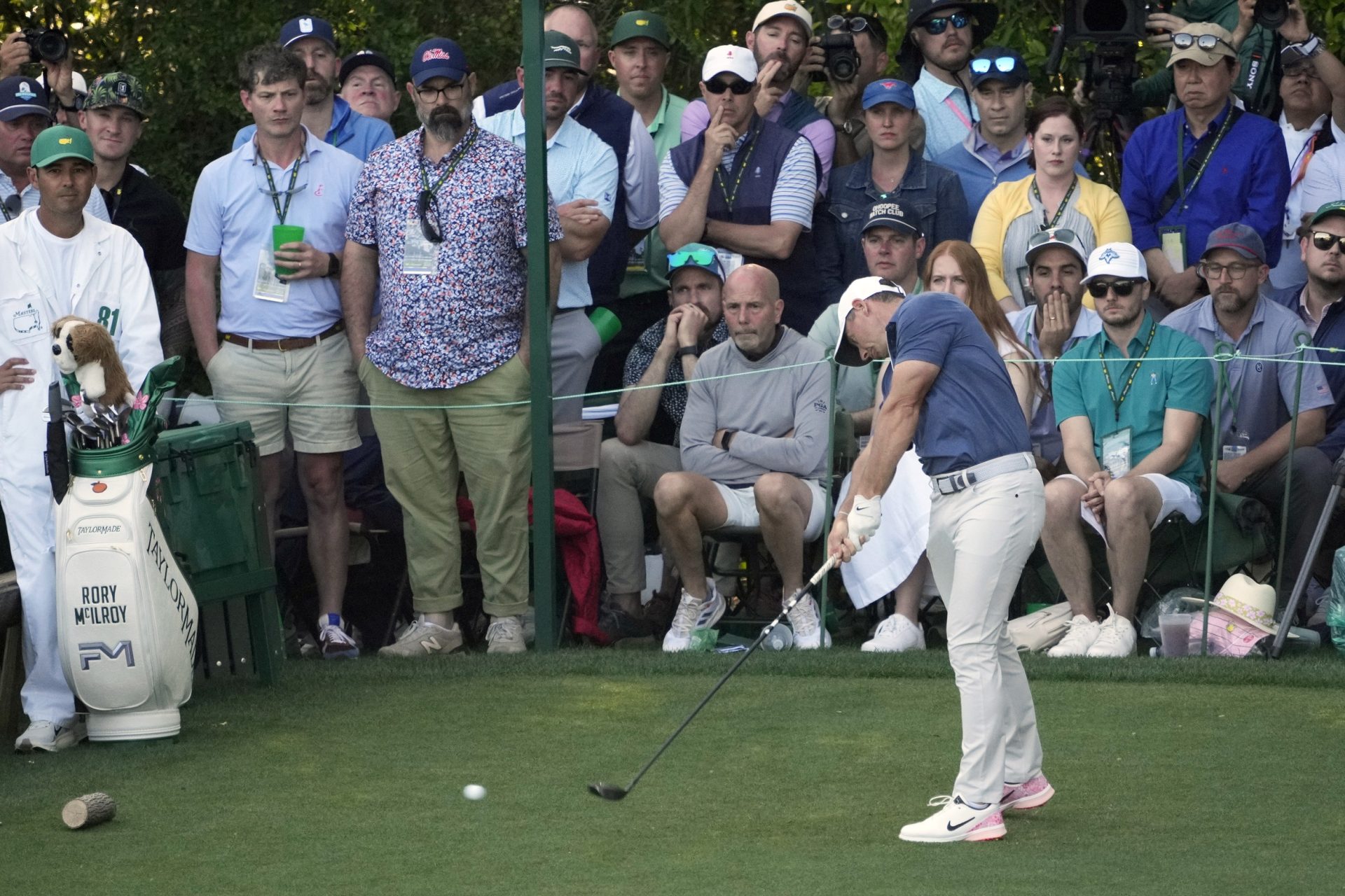 Apr 13, 2025; Augusta, Georgia, USA; Rory McIlroy plays his shot from the 14th tee during the final round of the Masters Tournament at Augusta National Golf Club.