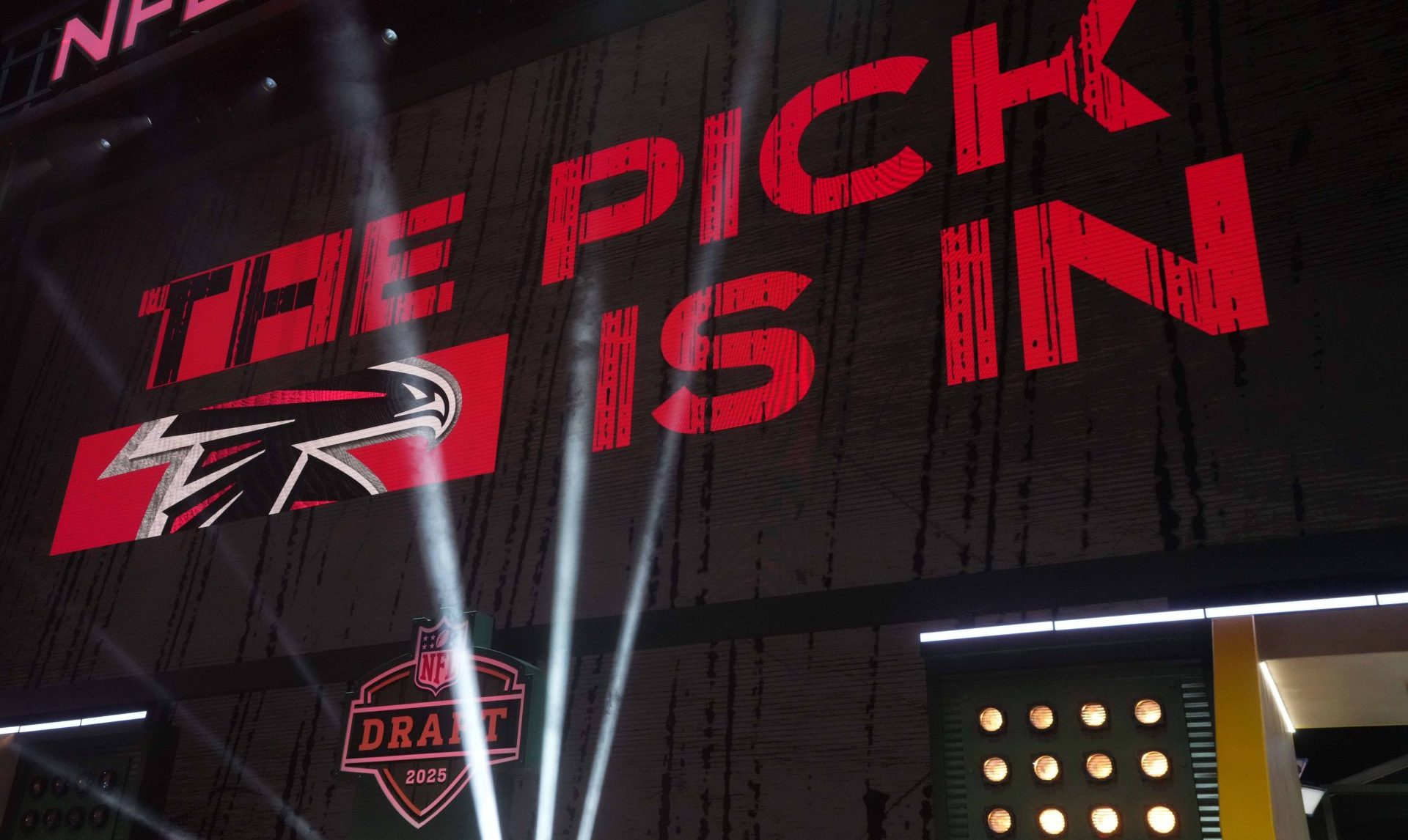Apr 24, 2025; Green Bay, WI, USA; The Atlanta Falcons logo is projected on the video board during the NFL Draft at Lambeau Field.