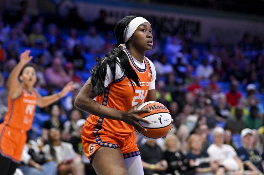 Aug 27, 2025; Arlington, Texas, USA; Connecticut Sun forward Aneesah Morrow (24) grabs a rebound against the Dallas Wings during the first half at College Park Center.