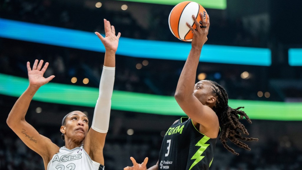 Sep 16, 2025; Seattle, Washington, USA; Seattle Storm forward Nneka Ogwumike (3) shoots the ball against Las Vegas Aces center A'ja Wilson (22) during the first half in game two of round one for the 2025 WNBA Playoffs at Climate Pledge Arena. Mandatory Credit: Stephen Brashear-Imagn Images