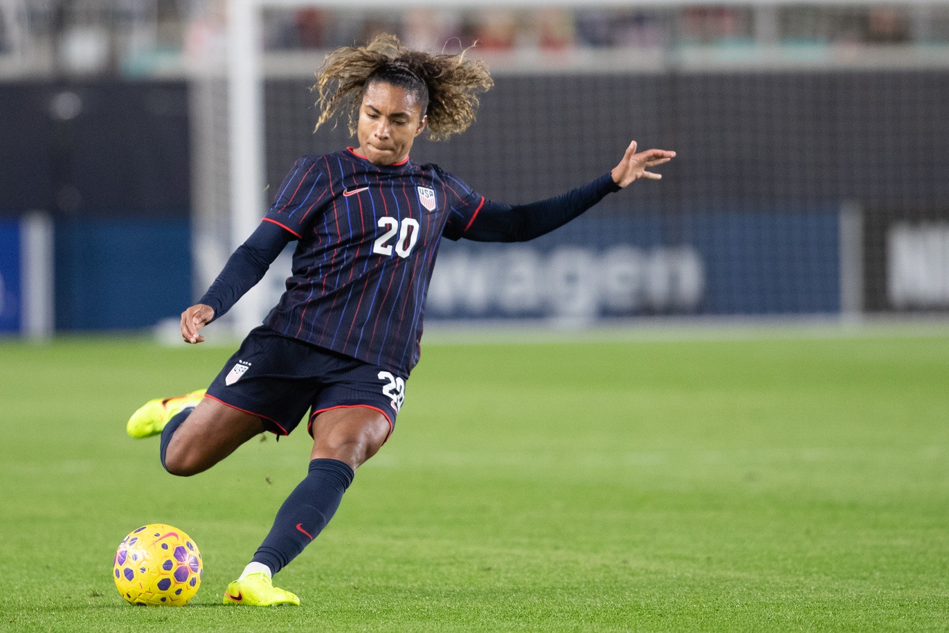 Oct 29, 2025; Kansas City, Missouri, USA; USA midfielder Catarina Macario (20) kicks the ball during the first half of the match against New Zealand at CPKC Stadium.