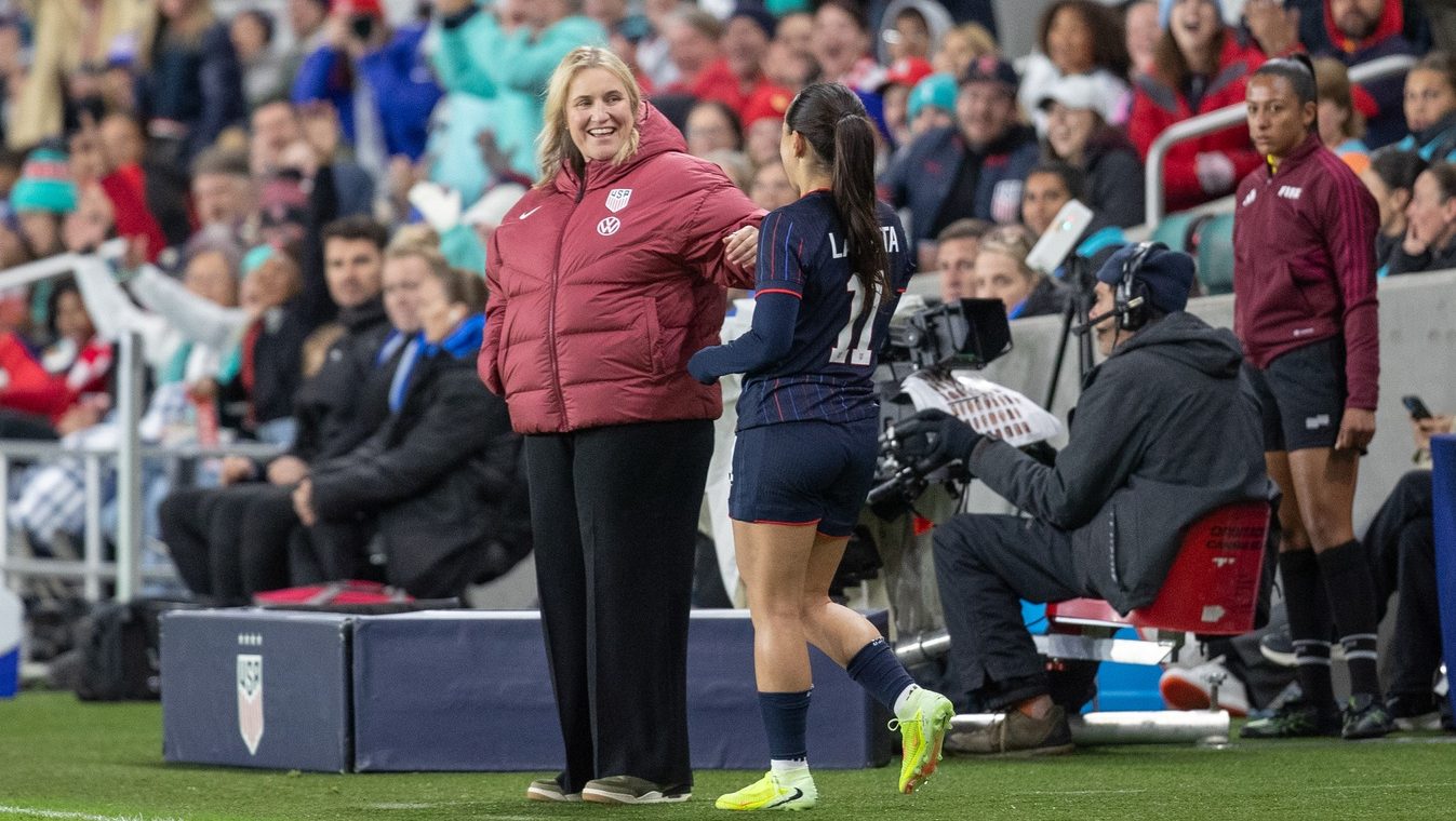 Oct 29, 2025; Kansas City, Missouri, USA; USA Head Coach Emma Hayes speaks with midfielder Lo’eau Labonta (11) during the second half of the match against New Zealand at CPKC Stadium.