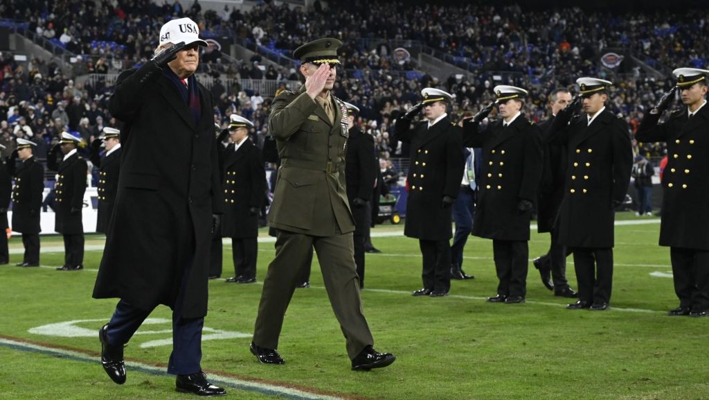 Dec 13, 2025; Baltimore, Maryland, USA; President Donald J Trump cross the field at half time of the game between the Navy Midshipmen and the Army West Point Black Knights at M&T Bank Stadium.