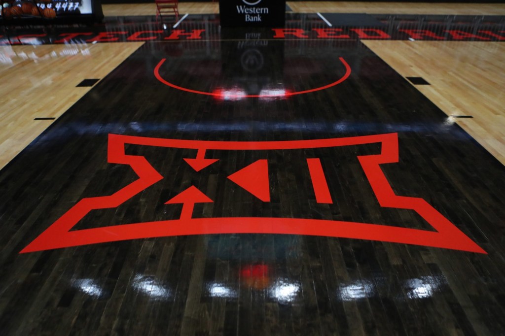 Dec 16, 2025; Lubbock, Texas, USA; A detailed view of the Big 12 logo on the floor of the United Supermarkets Arena before the game between the Northern Colorado Bears and the Texas Tech Red Raiders.