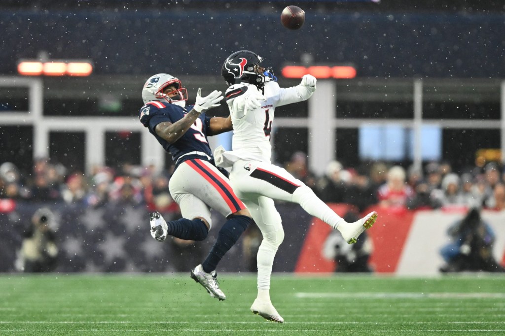 Jan 18, 2026; Foxborough, MA, USA; Houston Texans cornerback Kamari Lassiter (4) blocks a pass intended for New England Patriots wide receiver Kayshon Boutte (9) in the second quarter in an AFC Divisional Round game at Gillette Stadium.