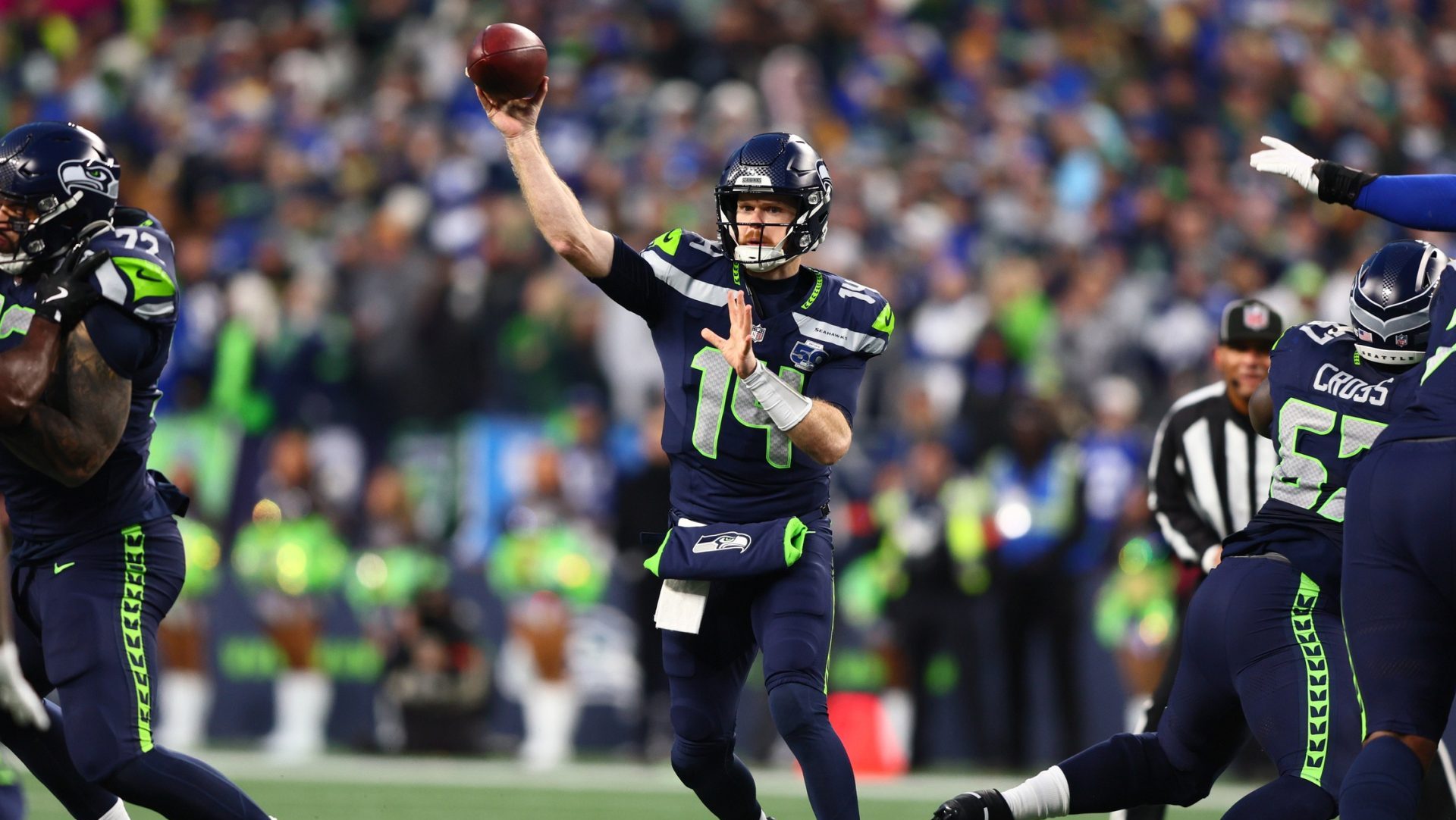 Jan 25, 2026; Seattle, WA, USA; Seattle Seahawks quarterback Sam Darnold (14) passes against the Los Angeles Rams during the first half in the 2026 NFC Championship Game at Lumen Field.