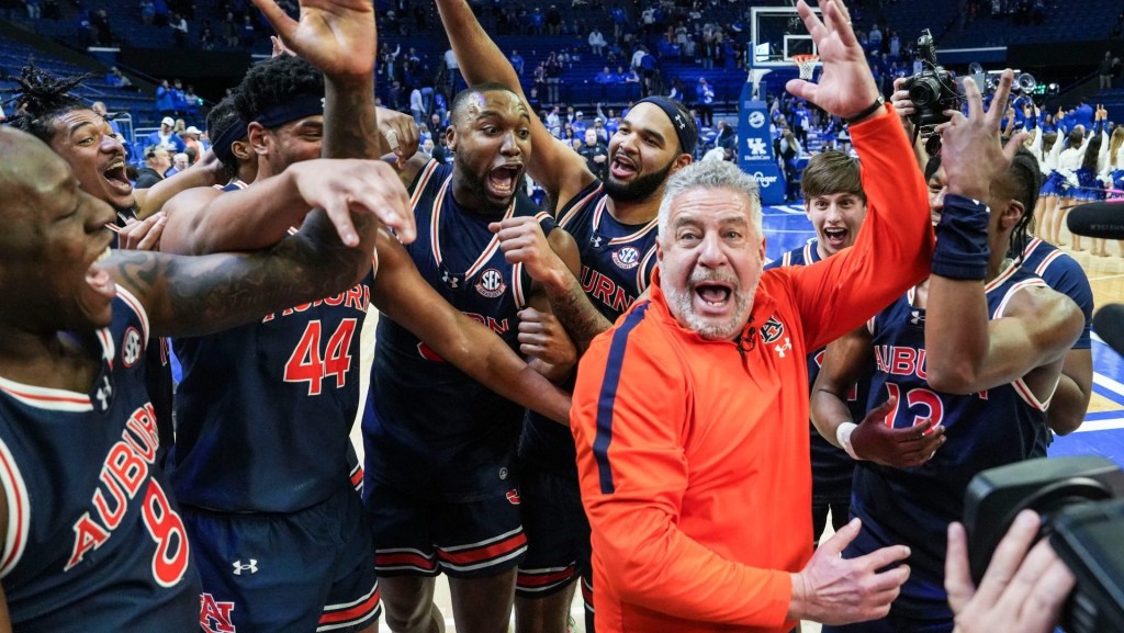 Auburn head coach Bruce Pearl and his No.1 Tigers celebrate after 94-78 win over Kentucky -- the first win at Rupp Arena since 1988 in SEC basketball Saturday afternoon in Lexington, Kentucky March 1, 2025