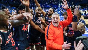 Auburn head coach Bruce Pearl and his No.1 Tigers celebrate after 94-78 win over Kentucky -- the first win at Rupp Arena since 1988 in SEC basketball Saturday afternoon in Lexington, Kentucky March 1, 2025