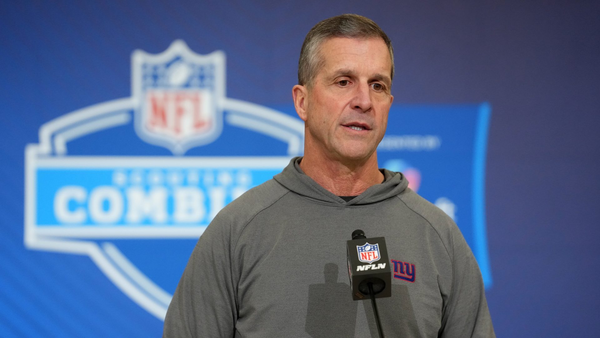 Feb 24, 2026; Indianapolis, IN, USA; New York Giants coach John Harbaugh speaks at the NFL Scouting Combine at the Indiana Convention Center.