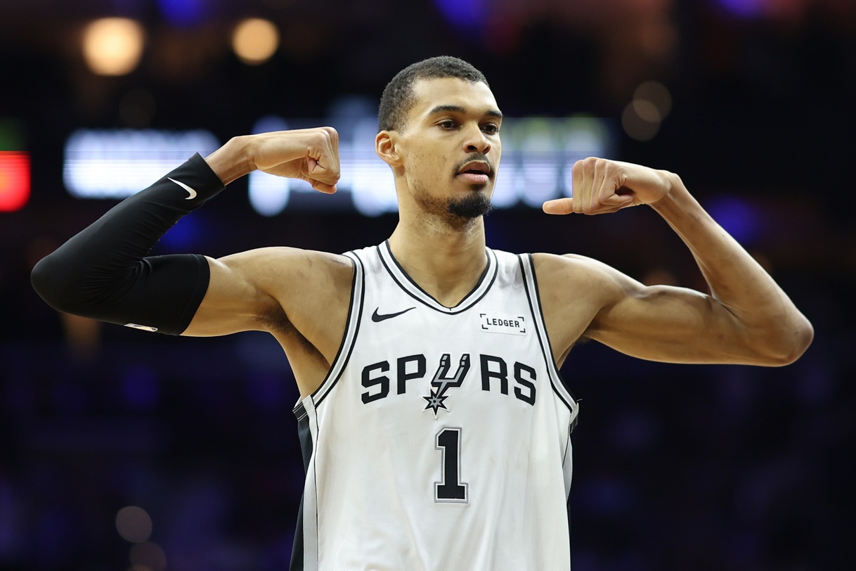 Mar 3, 2026; Philadelphia, Pennsylvania, USA; San Antonio Spurs forward Victor Wembanyama (1) reacts after his team scores against the Philadelphia 76ers during the second quarter at Xfinity Mobile Arena.