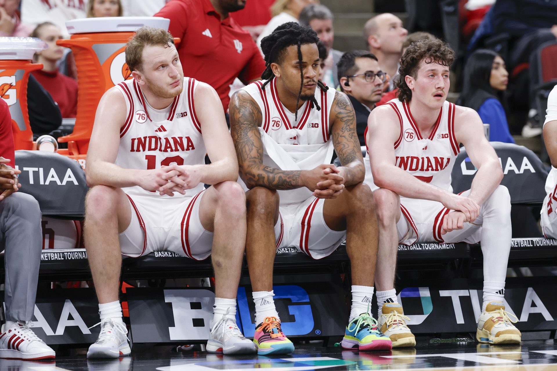 Mar 11, 2026; Chicago, IL, USA; Indiana Hoosiers forward Tucker Devries (12), guard Lamar Wilkerson (3) and guard Conor Enright (5) sit on the bench during the second half at United Center.