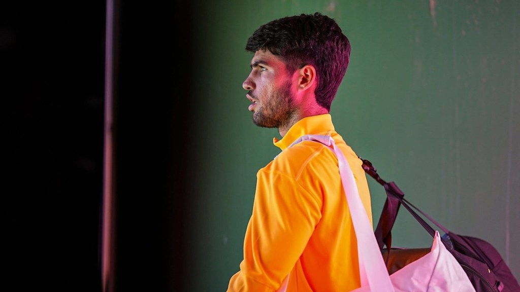 Carlos Alcaraz waits to be announced an take the court of Stadium 1 for his semifinal match against Daniil Medvedev at the BNP Paribas Open in Indian Wells, Calif., Saturday, March 14, 2026.