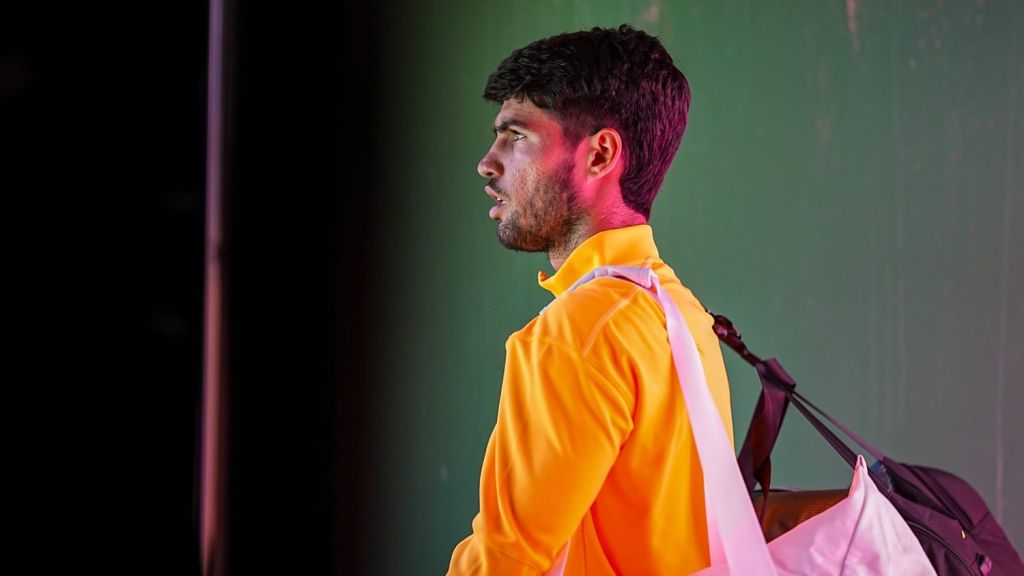 Carlos Alcaraz waits to be announced an take the court of Stadium 1 for his semifinal match against Daniil Medvedev at the BNP Paribas Open in Indian Wells, Calif., Saturday, March 14, 2026.