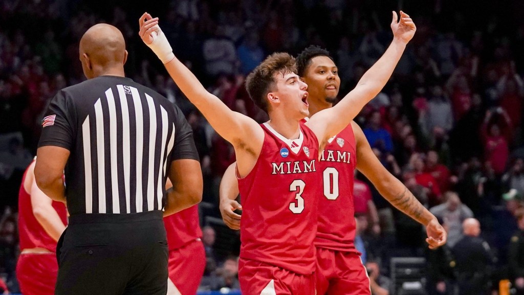 Miami (OH) RedHawks guard Luke Skaljac (3) celebrates at the conclusion of the NCAA Tournament First Four game between the Miami Redhawks and Southern Methodist University Mustangs, Wednesday, March 18, 2026, at University of Dayton Arena in Dayton, Oh. RedHawks won 89-79.