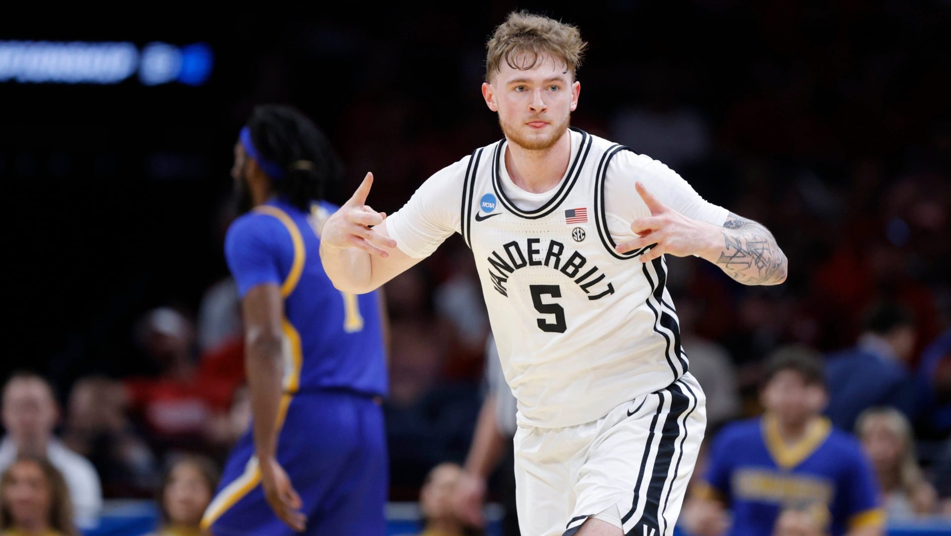 Vanderbilt Commodores forward Tyler Nickel (5) celebrates after making a 3-pointer during a first-round game in the NCAA men's basketball tournament between McNeese and Vanderbilt at Paycom Center in Oklahoma City, Thursday, March 19, 2026.
