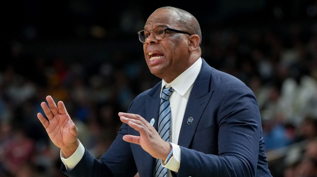 Mar 19, 2026; Greenville, SC, USA; North Carolina Tar Heels head coach Hubert Davis instructs his team against the VCU Rams in the second half of a first round game of the men's 2026 NCAA Tournament at Bon Secours Wellness Arena.