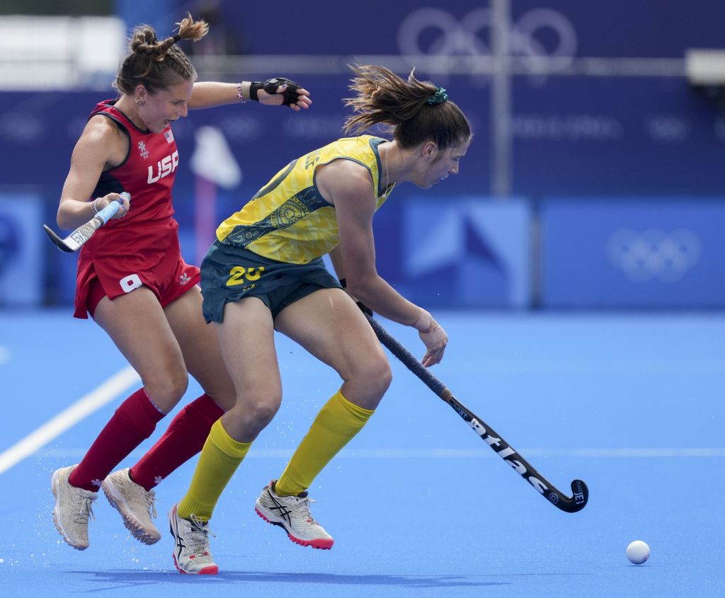 Jul 31, 2024; Colombes, France; United States defender Madeleine Zimmer (9) and Australia defender Karri Somerville (20) during the Paris 2024 Olympic Summer Games at Stade Yves-du-Manoir.