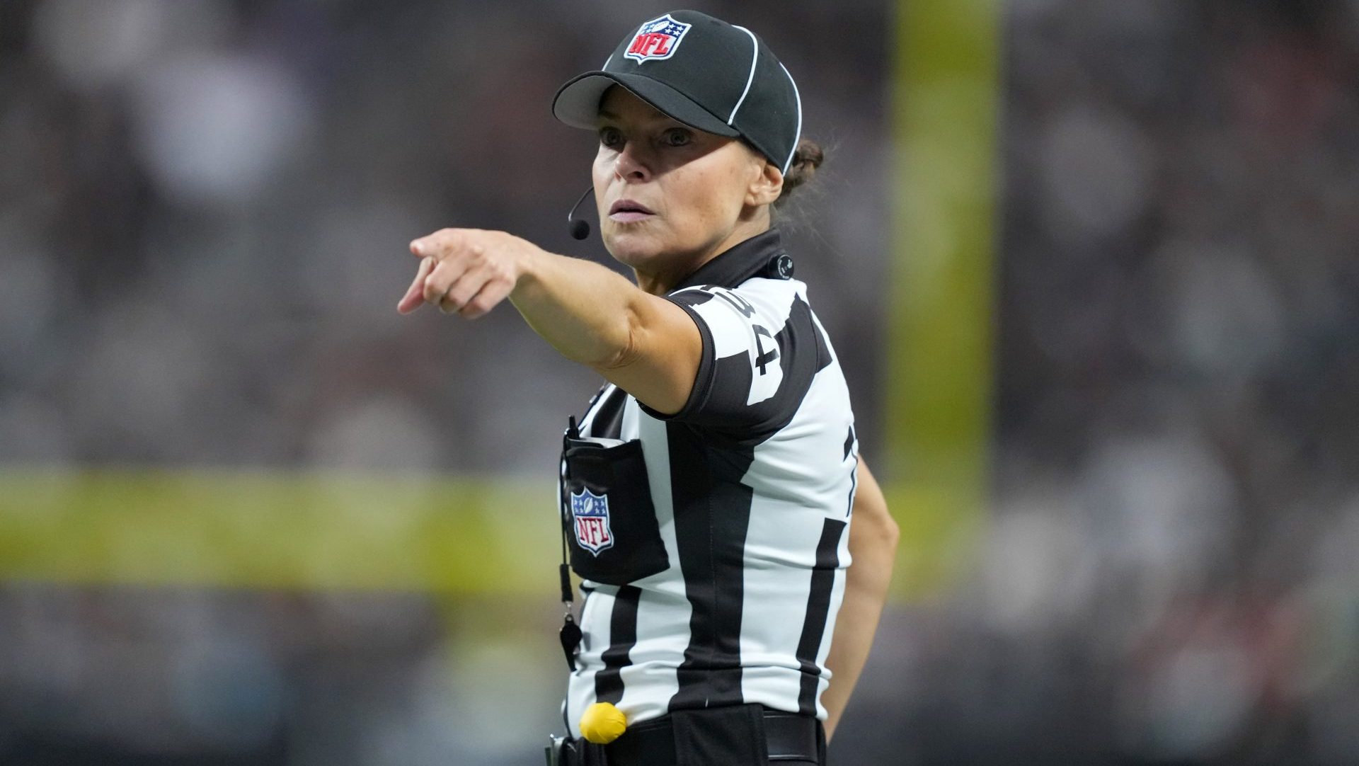 Dec 22, 2024; Paradise, Nevada, USA; NFL line judge Robin DeLorenzo (134) gestures during the game between the Jacksonville Jaguars and the Las Vegas Raiders Allegiant Stadium. Mandatory Credit: Kirby Lee-Imagn Images