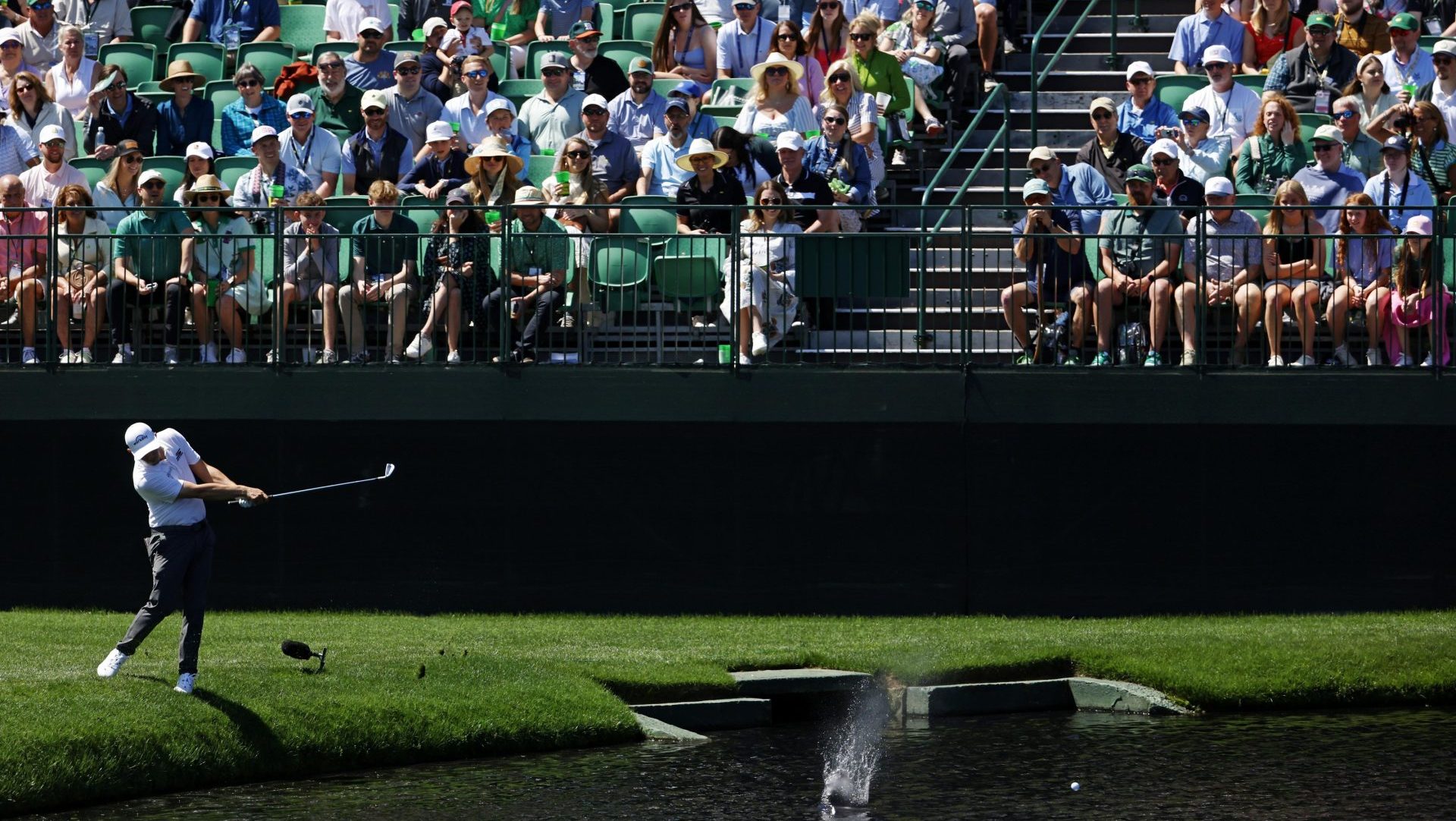 Apr 8, 2025; Augusta, Georgia, USA; Matt Fitzpatrick skips his ball on the 16th hole during a practice round for the Masters Tournament at Augusta National Golf Club. Mandatory Credit: Peter Casey-Imagn Images