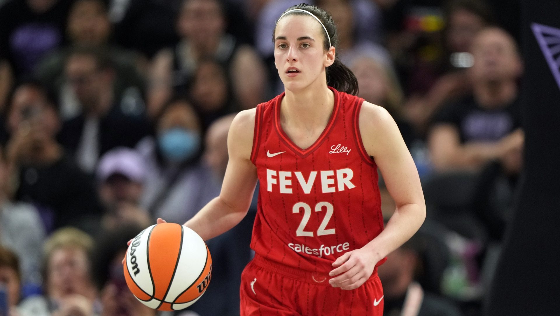 Jun 19, 2025; San Francisco, California, USA; Indiana Fever guard Caitlin Clark (22) dribbles against the Golden State Valkyries during the fourth quarter at Chase Center. Mandatory Credit: Darren Yamashita-Imagn Images