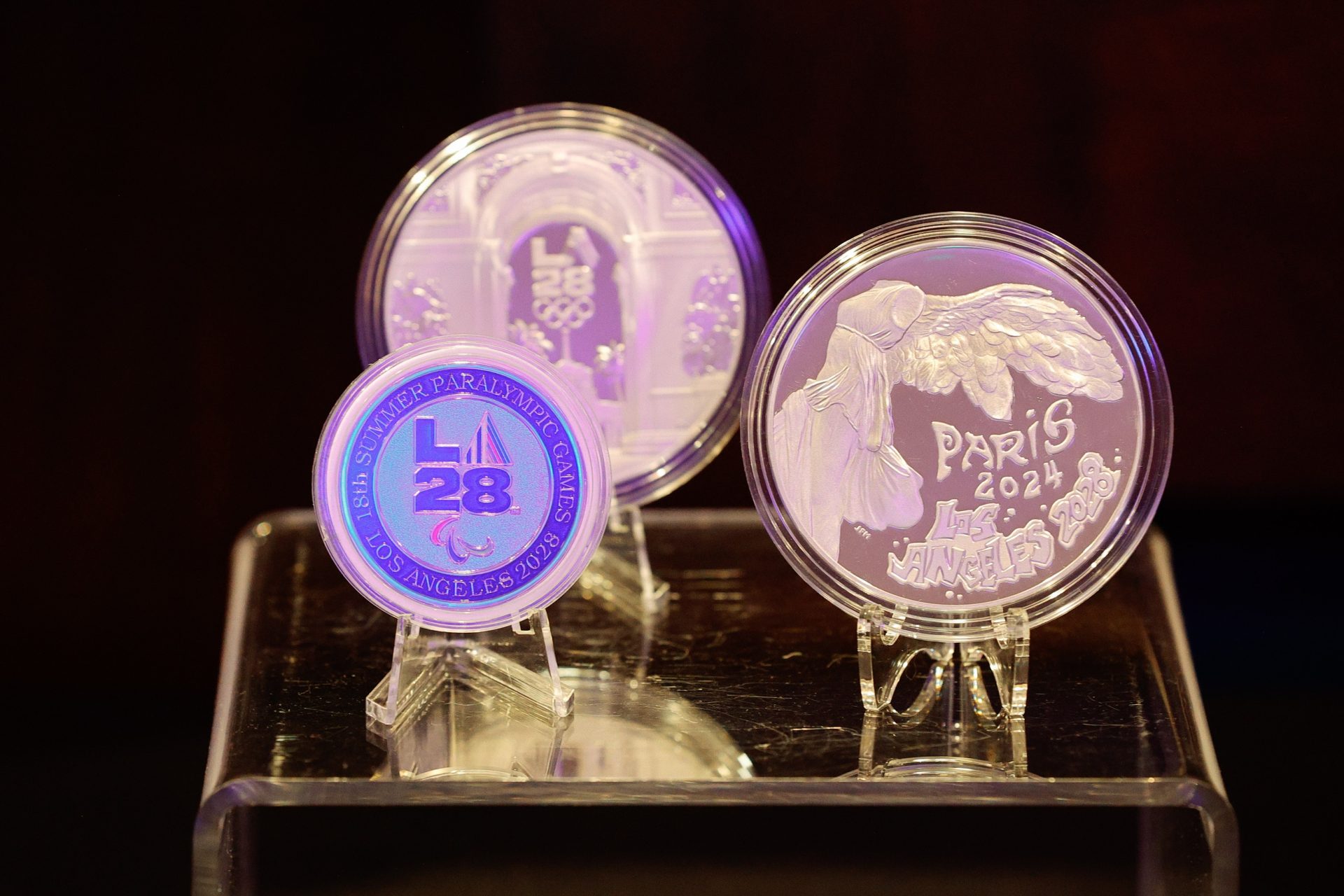July 12, 2025; Colorado Springs, CO, USA; A general view of the LA28 commemorative coins and Paris 2024 to LA 2028 handover medallions during the U.S. Olympic & Paralympic Hall of Fame Class of 2025 Induction Ceremony at The Broadmoor.