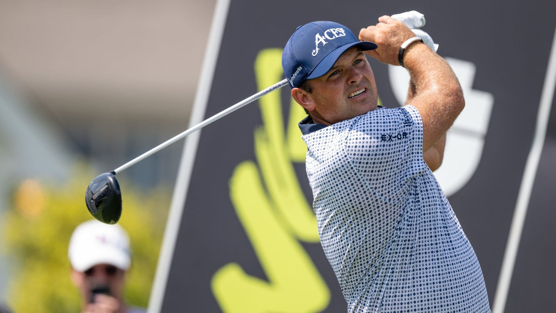 Aug 15, 2025; Indianapolis, IN, United States; Patrick Reed of 4 Aces GC tees off on the 6th hole during the first round of LIV Golf Indianapolis.